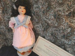 8.5" PORCELAIN DANBURY MINT BRIGITTE FRANCE OR SUISAN SCOTLAND  DOLL, STAND, CERTIFICATE